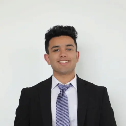 Employee looking at camera smiling